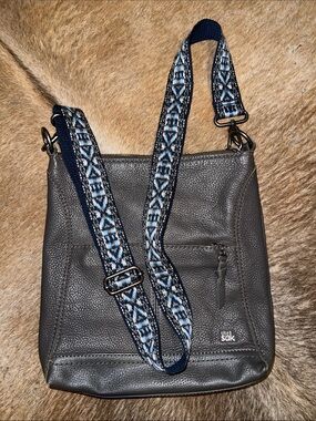 The Sak Gray Pebbled Leather Crossbody with Blue Patterned Strap
